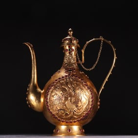 A piece of clear copper gilt gem-encrusted phoenix flask
