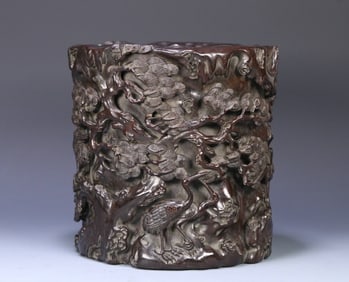 A piece of Qing Dynasty small-leaf red sandalwood relief "Pine Crane Longevity" pen holder