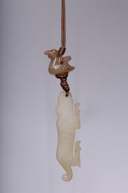 A piece of Hetian jade with Qin Xuan, bird, jade tiger, and multi-treasure strings