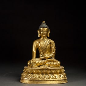 A piece of bronze gilt Buddha