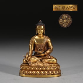 A Ming fine-cast bronze gilt statue of Medicine Buddha