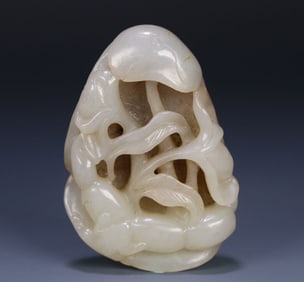 A Qing Dynasty Hetian jade seed lotus root lotus leaf carving