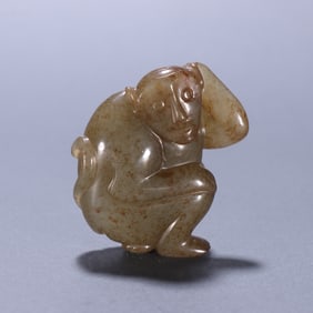 A Ming Hetian jade monkey carving