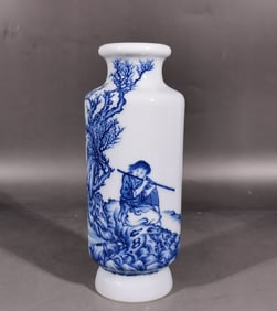 A blue and white shepherd boy stick chasing bottle