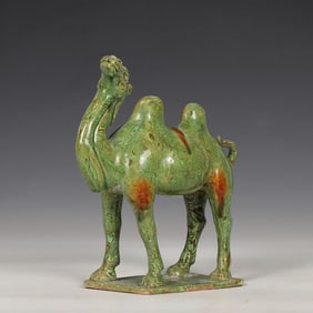 A Tang twisted green glazed camel ornament