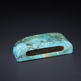 A piece of ancient turquoise sword ornament