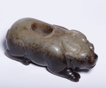 A piece of Hetian jade carbon Qinrui beast water cheng