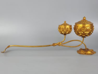 A piece of copper gilt lotus incense hand-held stove
