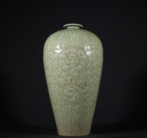 A Song Dynasty Yaozhou kiln carved peony floral pattern plum vase