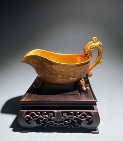 A piece of Tang Dynasty bronze gilt wine glass