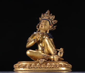 A bronze gilt statue of the Celestial Maiden