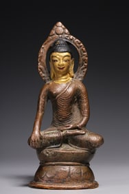 A Song and Yuan Dynasty bronze clay gold seated statue of Sakyamuni