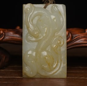 A piece of Hetian jade carved dragon pattern wear
