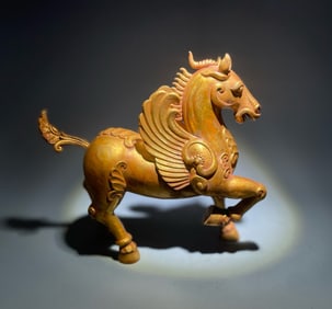 A piece of Tang Dynasty bronze gilt Pegasus