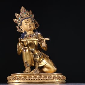 A bronze gilt statue of the Celestial Maiden