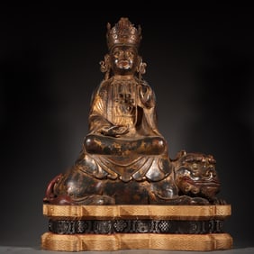 A Tibetan bronze clay gold statue of Manjushri