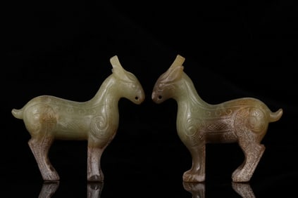 A pair of Hetian topaz beast tapirs