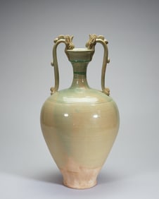 A piece of Tang Dynasty celadon glazed double dragon bottle