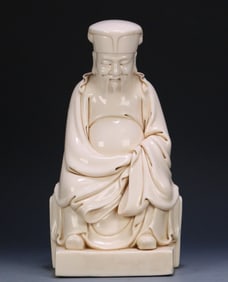 A Dehua white porcelain civil official ornament
