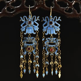 A pair of clear silver gilt gemstone drop earrings