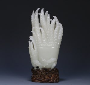 A Qing Dynasty Hetian white jade bergamot flower ornament