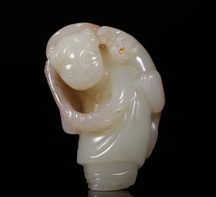A piece of Ming and Qing Dynasties: Hetian jade seed material with skin Qin holding lotus boy