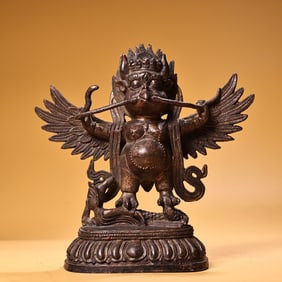 An all-bronze high-relief engraved gilt Dapeng golden-winged bird Buddha statue