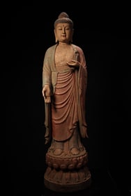 An old wood carving painted station Shakyamuni Buddha statue