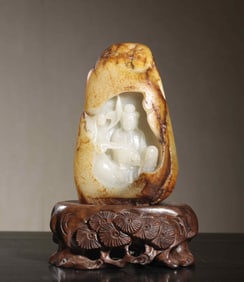 A statue of Guanyin with skin of Hetian jade seed material