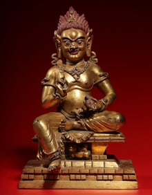 A Qing Dynasty bronze gilt statue of the Great Achiever