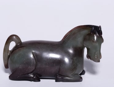 A piece of Hetian jade with a lying horse