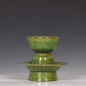 A set of twisted green glazed trays