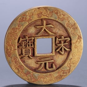 A piece of bronze gilt Song ingots