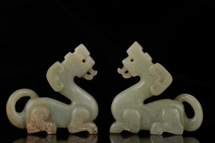 A pair of Hetian topaz tigermons