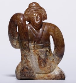 A piece of Hetian jade seeds is full of jade dancers