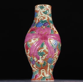 A clear enamel colored wrapper bottle