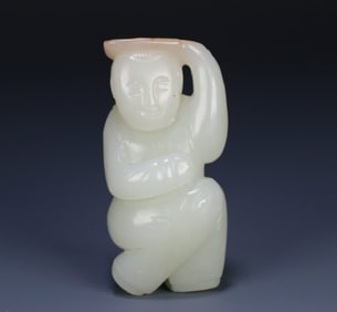 A Hetian jade seed boy carving