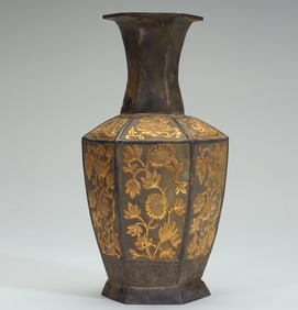 A Tang Dynasty silver-gilt six-petal bottle