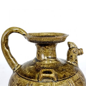 A piece of Tang Yue kiln celadon chicken head pot