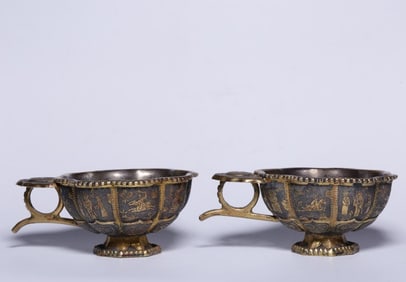 A pair of Tang Dynasty silver-gilt engraved character story cups