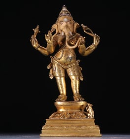 A piece of bronze gilt elephant trunk god
