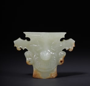 A piece of green jade mask jade ornament