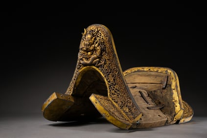 A Qing dynasty bronze gilt saddle