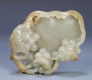 A piece of Qing Dynasty Hetian jade squirrel grape wash