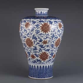 A large plum vase with red entwined lotus pattern in the blue and white glaze made in the Qianlong