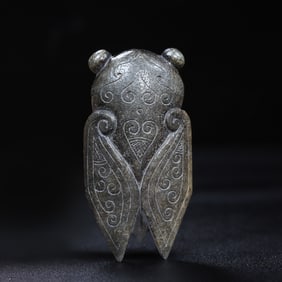 A piece of Hetian jade cicada