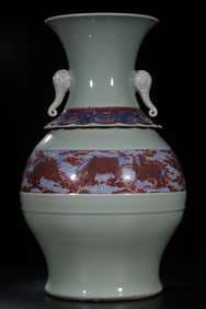 A mid-Qing Dynasty pink blue glaze blue and white glaze red double elephant ear appreciation bottle