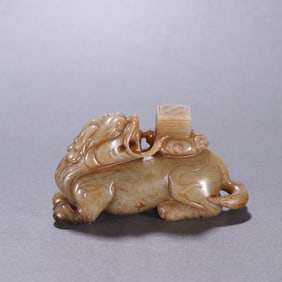 A Han Hetian jade unicorn book ornament