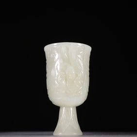 A piece of Qing Hetian jade flying pattern goblet