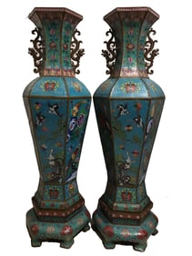 A pair of cloisonné enamel vases with cloisonné copper tires